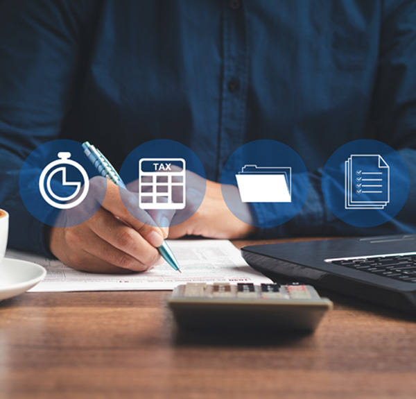 HR and payroll specialist managing taxes, compliance, and employee records using digital tools.